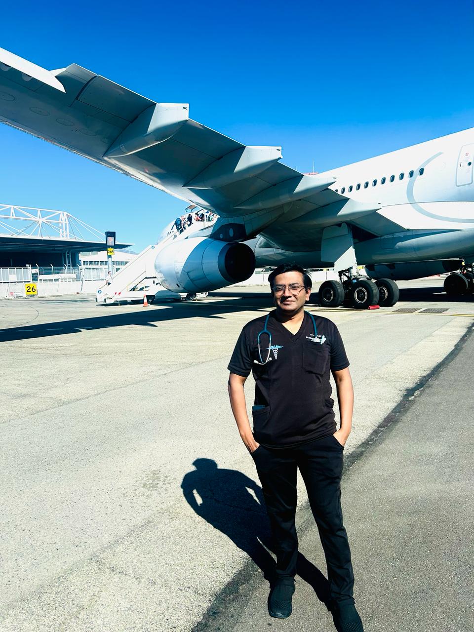 Dr. Jai Prakash Tak on the airport tarmac